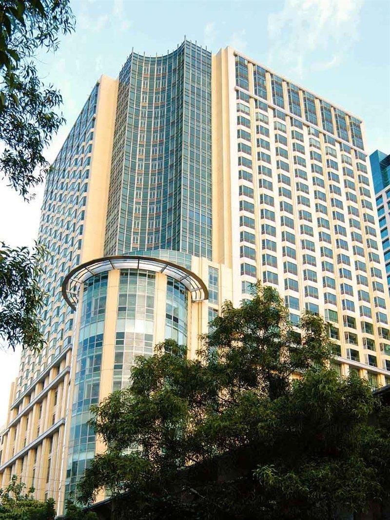 New Coast Hotel Манила Экстерьер фото The building of the National University of Singapore