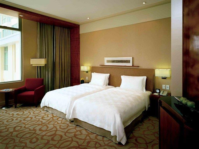 New Coast Hotel Манила Экстерьер фото A room at the hotel